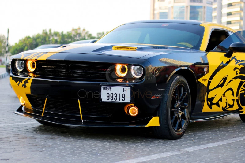 Yellow Dodge Challenger V6 2018 for rent in Dubai 5